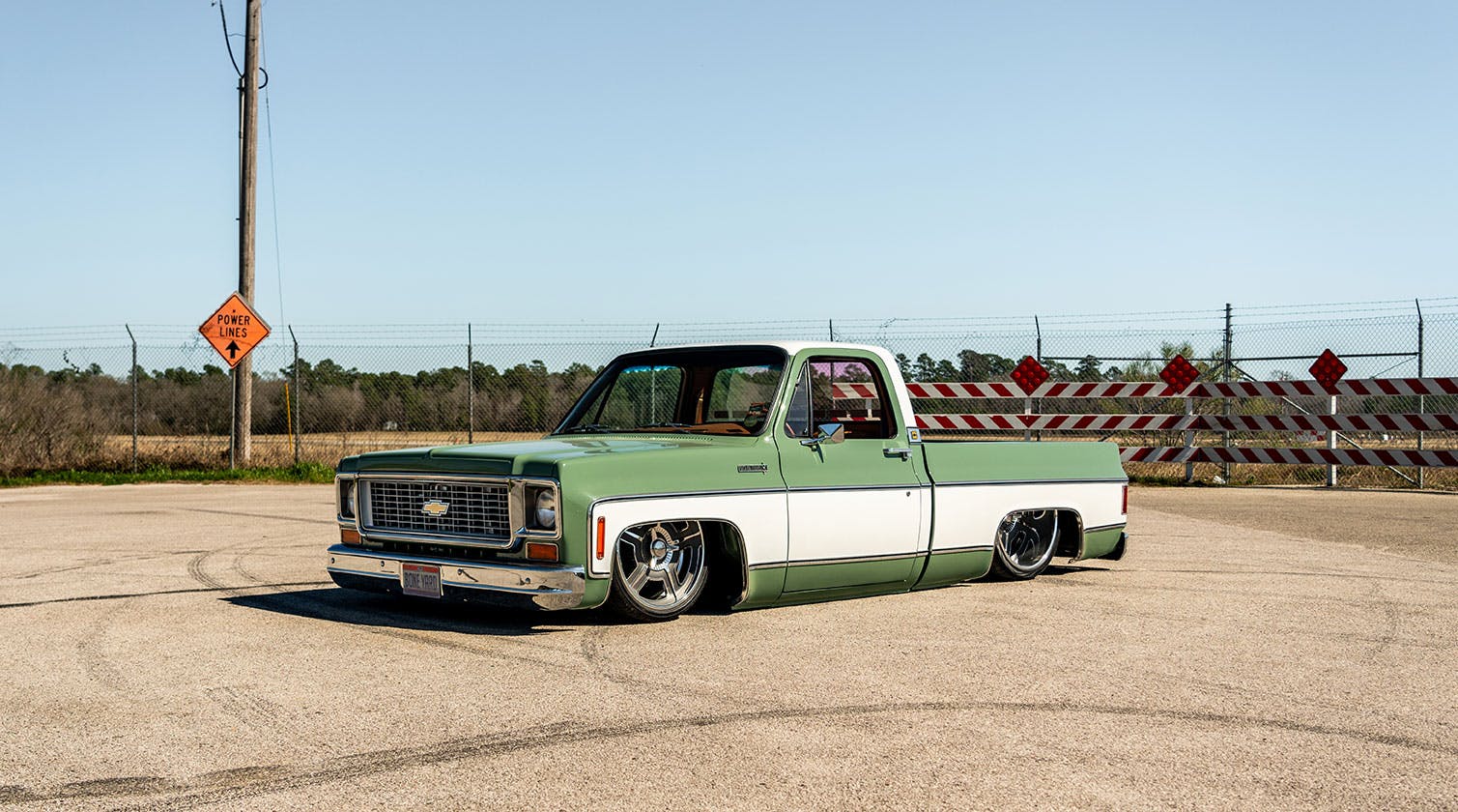 A lowered 1976 Chevy C10 at Lone Star Throwdown 2024