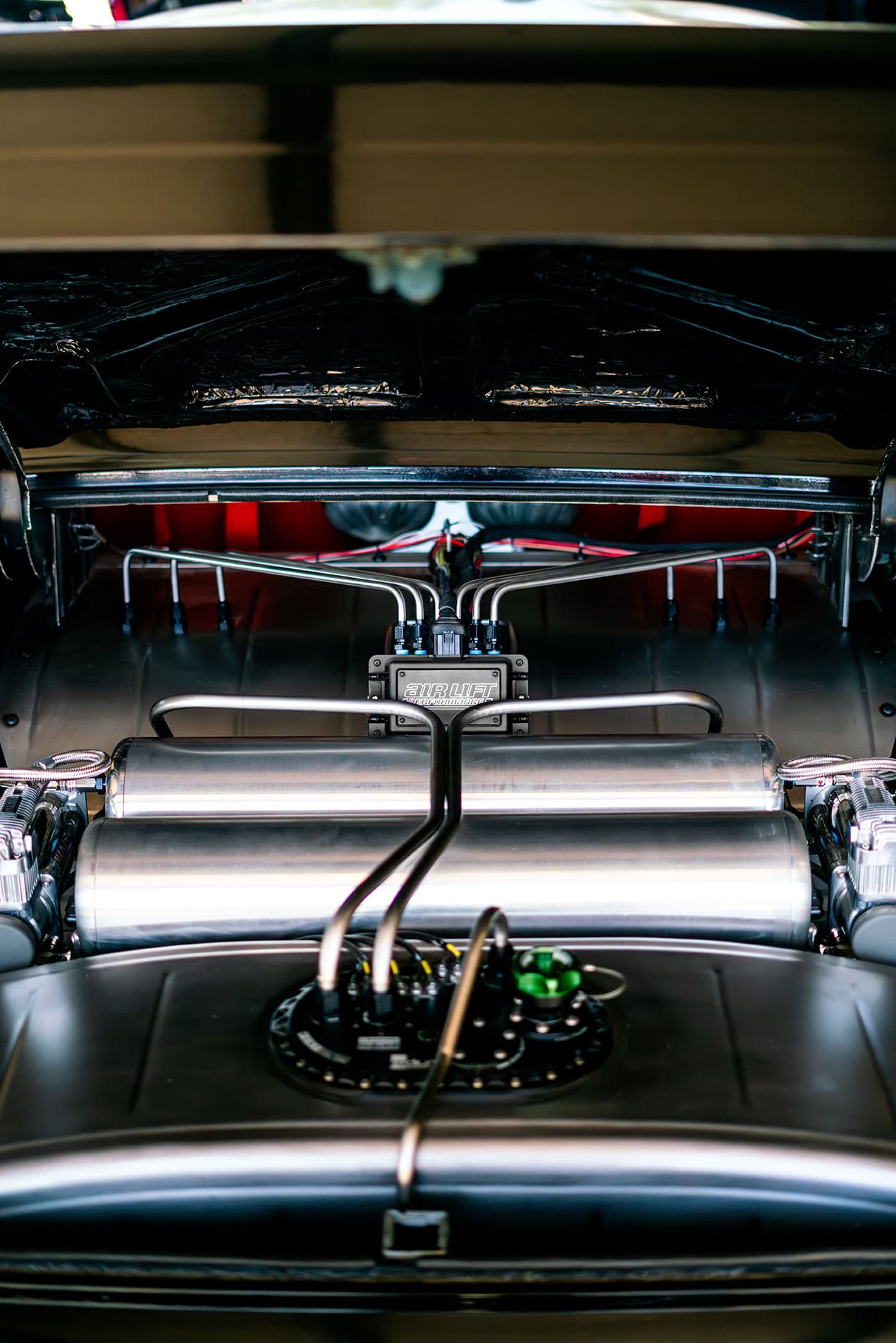 Lowered vehcile featuring Air Lift Performance products at Lone Star Throwdown 2024